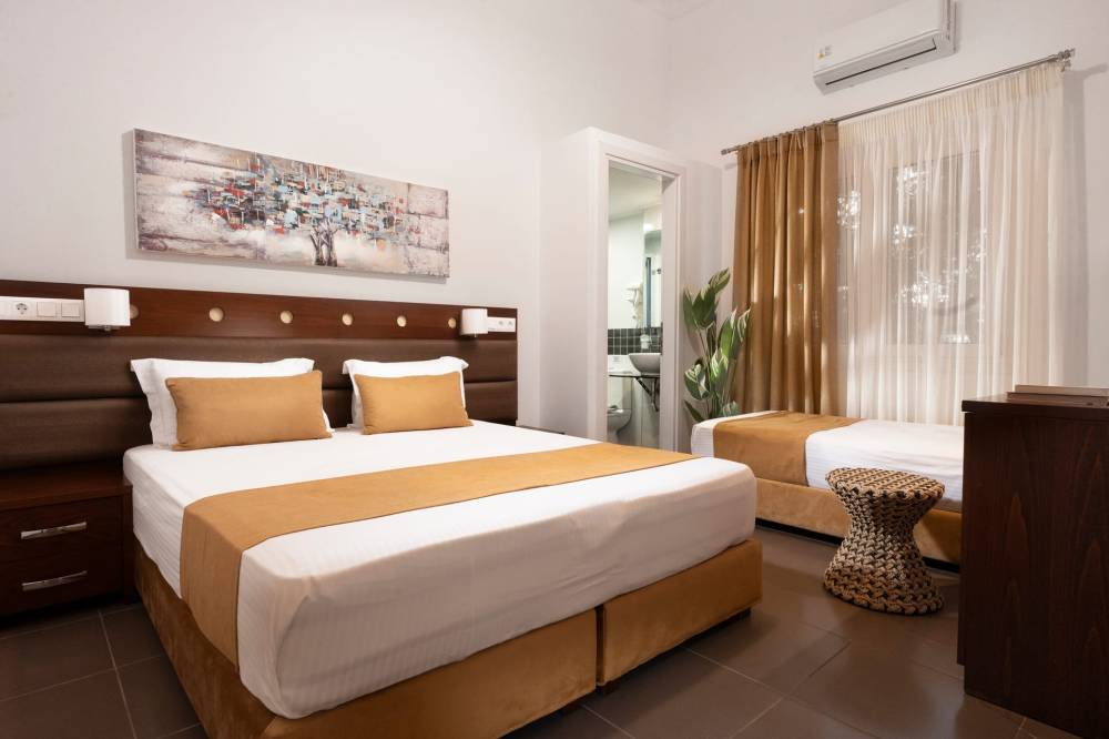 Economy Triple Room - Semiramis Guesthouse